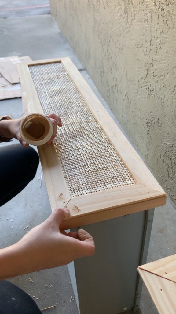 Process for adding rattan to IKEA Malm Dresser - applying wood glue.